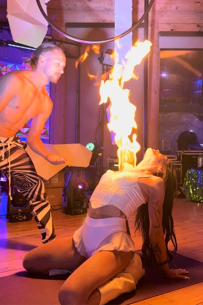 Internal Ignition ceremony: Tyler and a participant holding a sacred fire bubble together